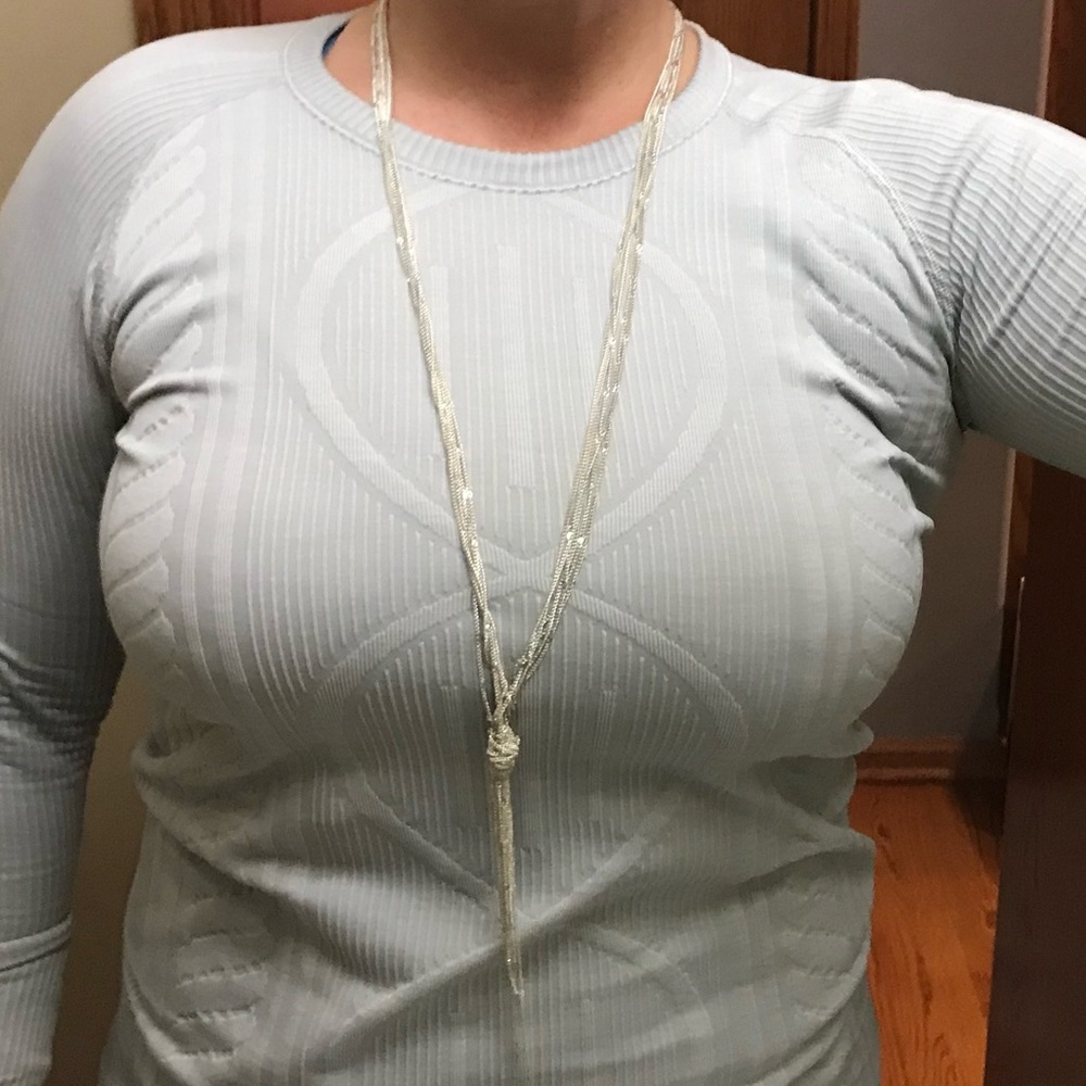 Silver multi chain necklace.